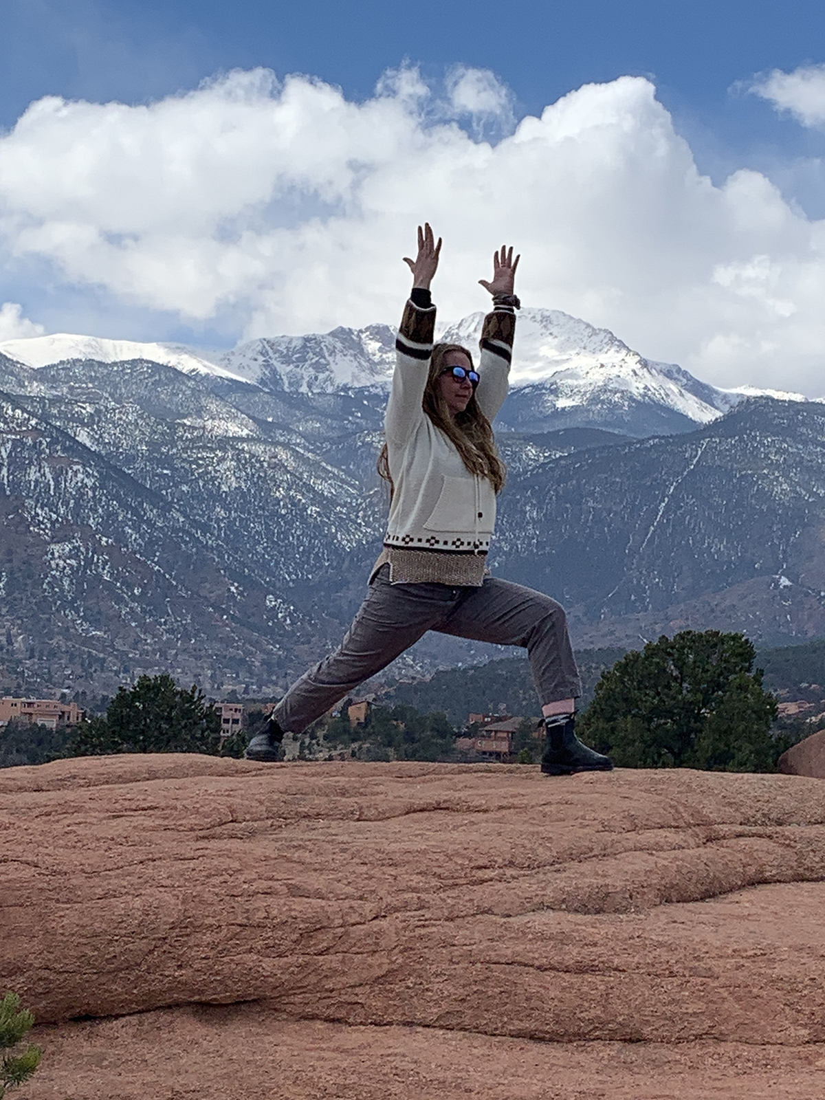 Heather practicing Warrior I at Garden of the Gods, Colorado Springs.